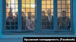 Крымские татары, задержанные за пикет в Москве, в отделении полиции, 12 июля 2019 года